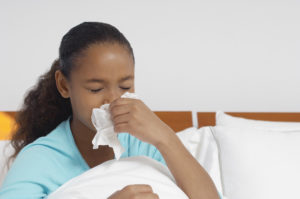 health benefits of a clean home child blowing nose